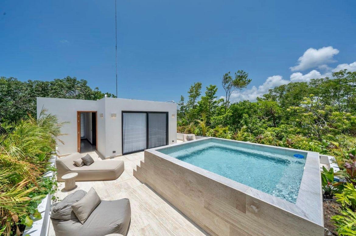 Casa Tulum IV — rooftop pool with jungle view